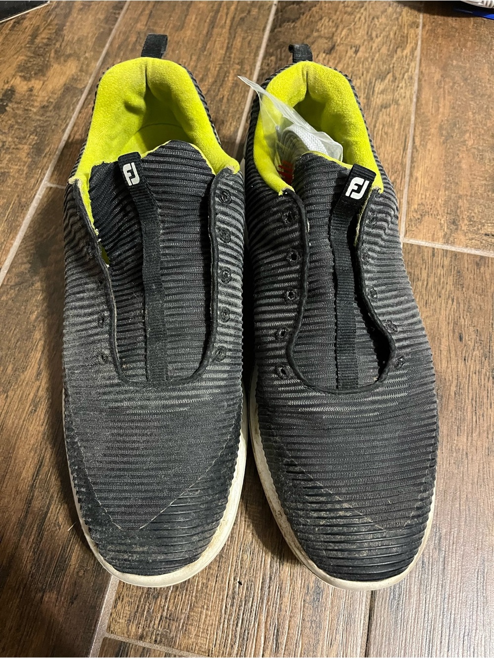 FootJoy Black Slip-On Golf Sneakers with Neon Yellow Lining